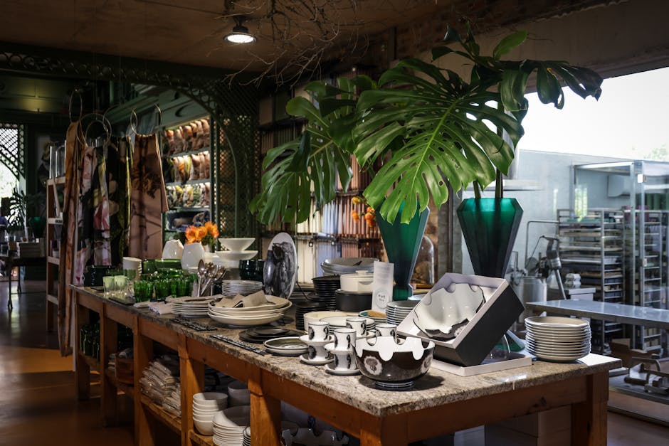 Elegant tableware and decor arrangement showcased in a stylish indoor store setting.